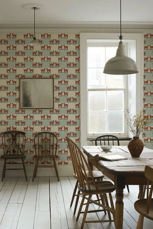 A Leopard Never Changes His Spots wallpaper by Annika Reed in cream, leaping leopards in a dining area