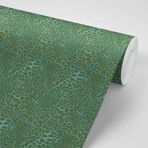 Leopard wallpaper by Tatie Lou in green, roll showing a leopard-spot print