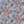 Les Fleurs wallpaper by Tatie Lou in blue and pink, full repeat of dense painterly flowers