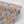 Les Fleurs wallpaper by Tatie Lou in pale blue, flat sample of dense painterly flowers