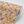 Les Fleurs wallpaper by Tatie Lou in yellow, roll showing dense painterly flowers