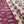 Lilo linen by Bethie Tricks in pink and red, draped, showing scalloped stripes