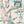 Liquid Lab wallpaper by Brand McKenzie in cream, close view of bottles and laboratory glassware