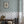 Little Fiorita Stripe wallpaper by Deus ex Gardenia in teal and white, floral vine stripes in a hallway