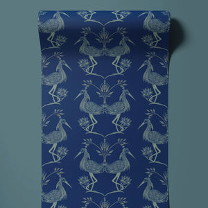 Lotus wallpaper by Tatie Lou in blue, partly unrolled roll showing lotus birds