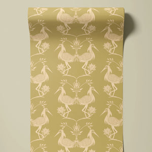 Lotus wallpaper by Tatie Lou in yellow, partly unrolled roll showing lotus birds