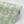 Lotus wallpaper by Tatie Lou in mint green, sample roll showing lotus birds