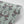Lotus wallpaper by Tatie Lou in green, sample roll showing lotus birds