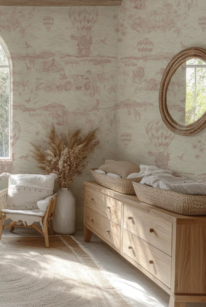 Lyons Den linen by Victoria Sanders in pale pink, a hot-air balloon and safari toile on a bathroom wall