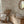 Lyons Den wallpaper by Victoria Sanders in pale pink, a hot-air balloon and safari toile in a bathroom