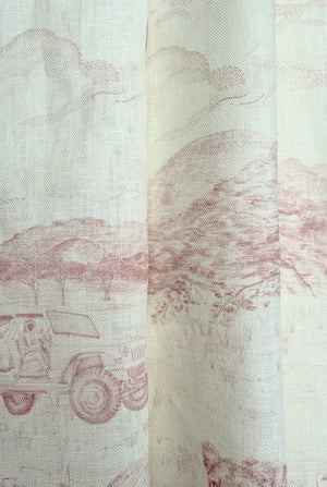 Lyons Den linen by Victoria Sanders in pale pink, draped, showing a hot-air balloon and safari toile