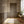 Magnolia in Blossom wallpaper by Dami and Em Design in beige, magnolia branches in a hallway