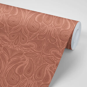 Margaux wallpaper by Tatie Lou in coral, roll showing marbled swirls