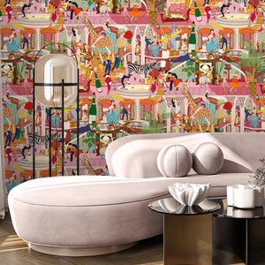 Mayhem Mansion wallpaper by Brand McKenzie in orange and pink, animals partying in a mansion behind a sofa in a living room