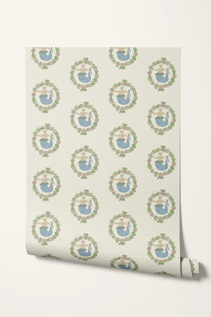 Mermaids in Seashore wallpaper by Annika Reed in cream and green, roll showing mermaids in wreaths
