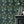 Midsummer wallpaper by Deus ex Gardenia in charcoal and green, trailing bellflowers around a fireplace