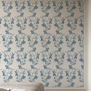 Midsummer wallpaper by Deus ex Gardenia in blue and white, trailing bellflowers in a bedroom