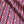 Morello linen by Bethie Tricks in red and blue, draped, showing block-print stripes
