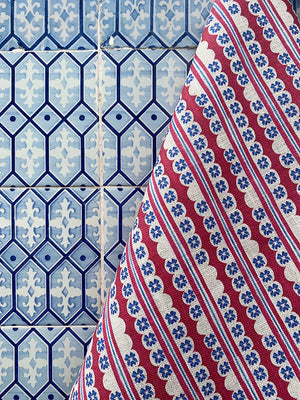 Morello linen by Bethie Tricks in red and blue, flat sample of block-print stripes