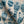 Muggle of Jugs linen by Annika Reed in blue, in soft folds showing painted jugs and vases