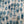 Muggle of Jugs linen by Annika Reed in blue, draped, showing painted jugs and vases