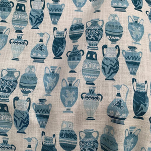 Muggle of Jugs linen by Annika Reed in blue, draped, showing painted jugs and vases