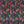 Spectre Ikat wallpaper by Victoria Sanders in multicolour, flat sample of a blurred ikat design