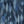 Spectre Ikat wallpaper by Victoria Sanders in blue, flat sample of a blurred ikat design