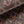 Mumbai Deco velvet by Tatie Lou in brown, in soft folds showing Deco fan shapes