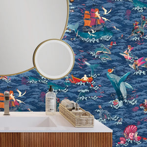 Ocean Waves wallpaper by Brand McKenzie in blue, sea creatures in rolling waves on a bathroom wall