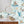 Ocean Waves wallpaper by Brand McKenzie in pale blue, sea creatures in rolling waves in a bathroom