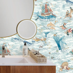 Ocean Waves wallpaper by Brand McKenzie in pale blue, sea creatures in rolling waves in a bathroom