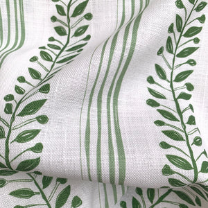 Olive linen by Annika Reed in green, draped, showing olive branch stripes