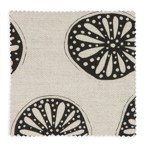 Opium linen by Bethie Tricks in black and white, flat sample of bold wheel motifs
