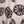 Opium linen by Bethie Tricks in black and white, full repeat of bold wheel motifs
