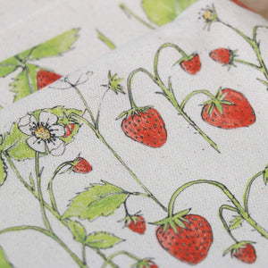 Organic Strawberry Patch linen by Seed Home Designs in red and green, full repeat of strawberries and flowers