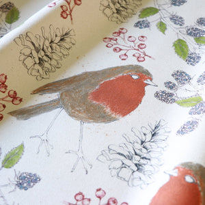 Organic Turn of the Seasons Robin linen by Seed Home Designs in orange and green, full repeat of robins among foliage
