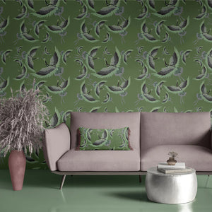 Pachamama wallpaper by Tatie Lou in olive, flying cranes on a living room wall
