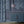 Pachamama wallpaper by Tatie Lou in navy, flying cranes above a sideboard