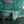 Pachamama wallpaper by Tatie Lou in teal, flying cranes in a bathroom