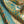 Pachamama velvet by Tatie Lou in peach, draped close-up of flying cranes