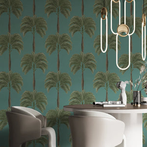 Palma wallpaper by Deus ex Gardenia in teal, tall palm trees in a dining area