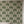 Palma wallpaper by Deus ex Gardenia in beige and green, pattern sample of tall palm trees