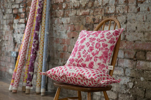 Paperflower linen by Bethie Tricks in pink, painted paper flowers made into a cushion