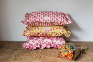 Paperflower linen by Bethie Tricks in pink, painted paper flowers on a scatter cushion