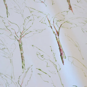 Tropical Paradise linen by Seed Home Designs in white, in soft folds showing slender tropical stems