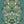 Paradise Party wallpaper by Brand McKenzie in green, detail of a mirrored tropical party scene