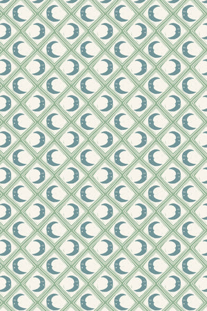 Kit Moon wallpaper by Annika Reed in blue and green, full repeat of crescent moons in a lattice