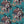 Phoenix wallpaper by Tatie Lou in teal and pink, flat sample of swirling phoenix feathers