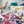 Pink and Blue linen by Bethie Tricks in pink and blue, draped close-up of painted blooms